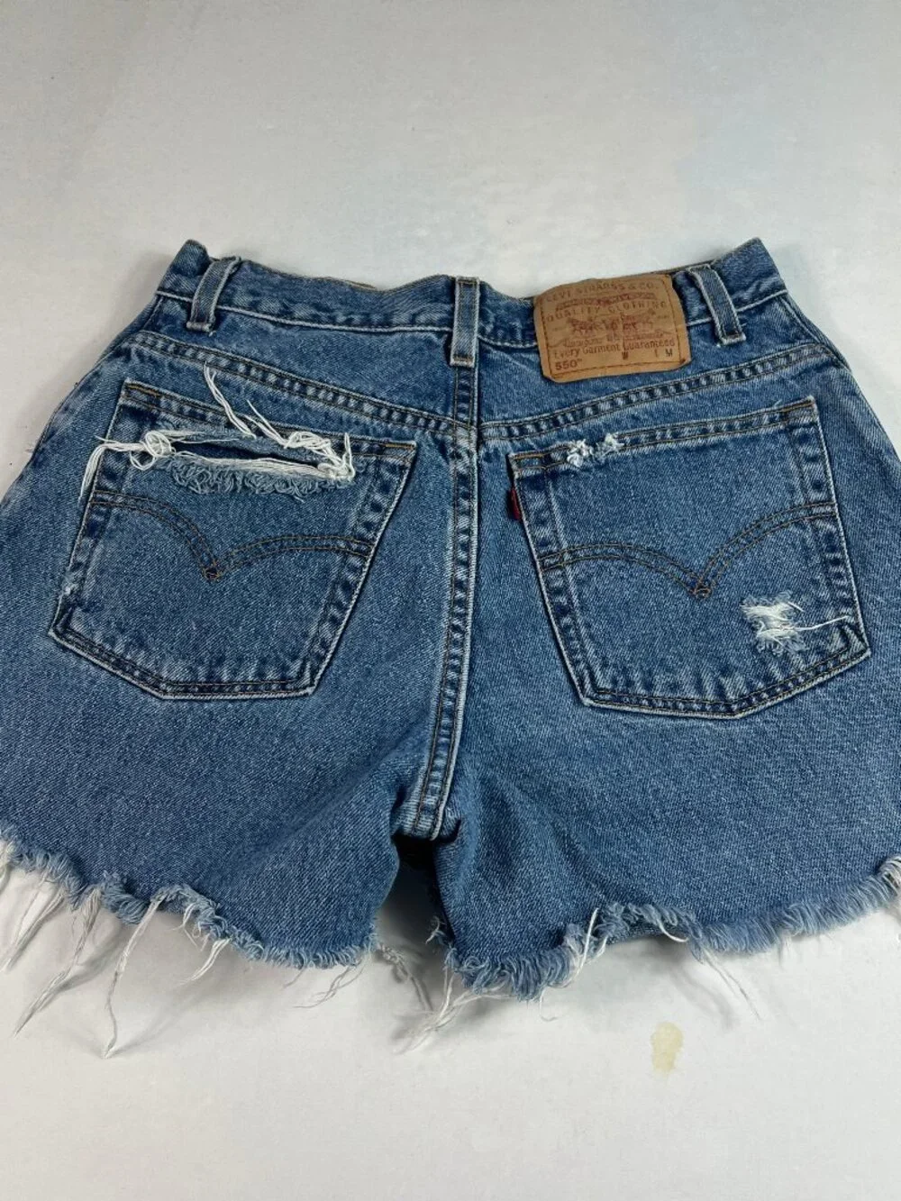 Y2K Levi's Jean Shorts Women 27* High Rise Blue Distressed Jorts USA Made Tag 10